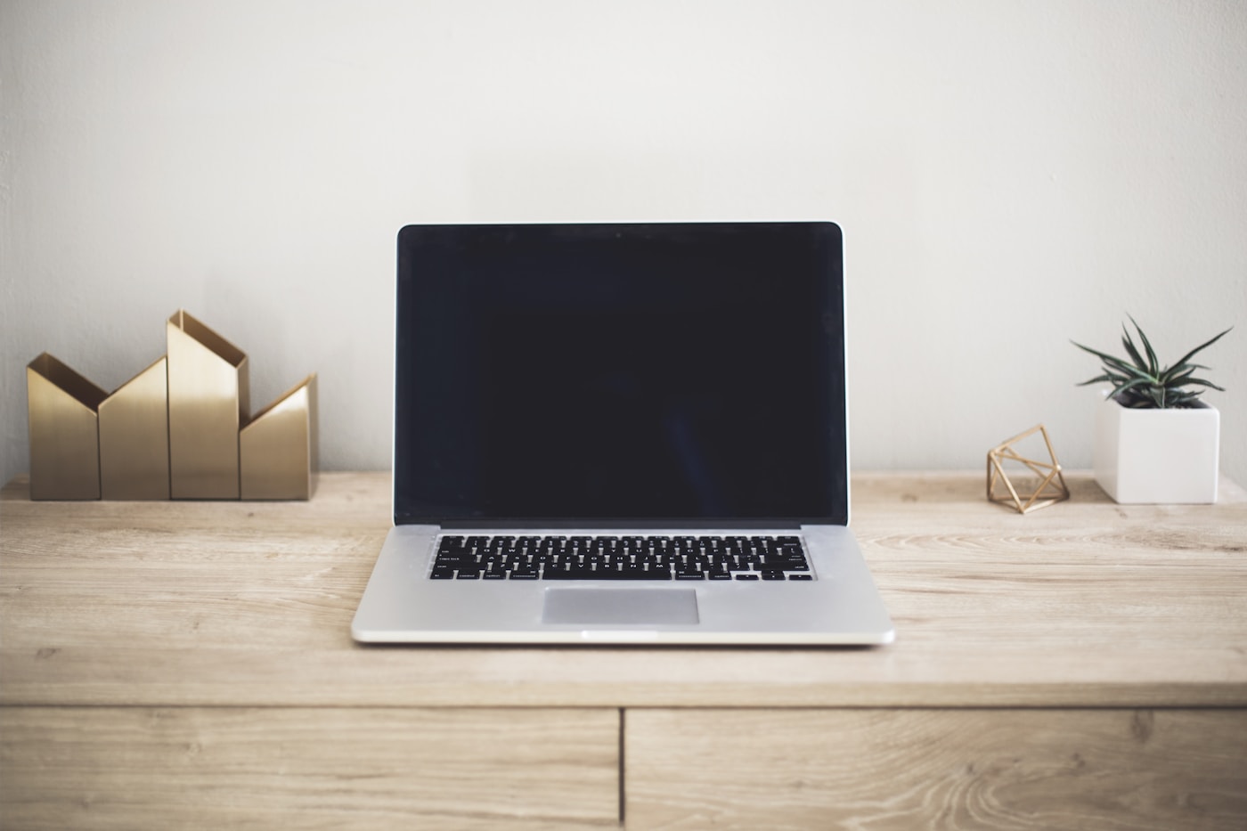 A modern laptop workspace representing the Bitcoin ETF inflow cooldown on August 8, 2026